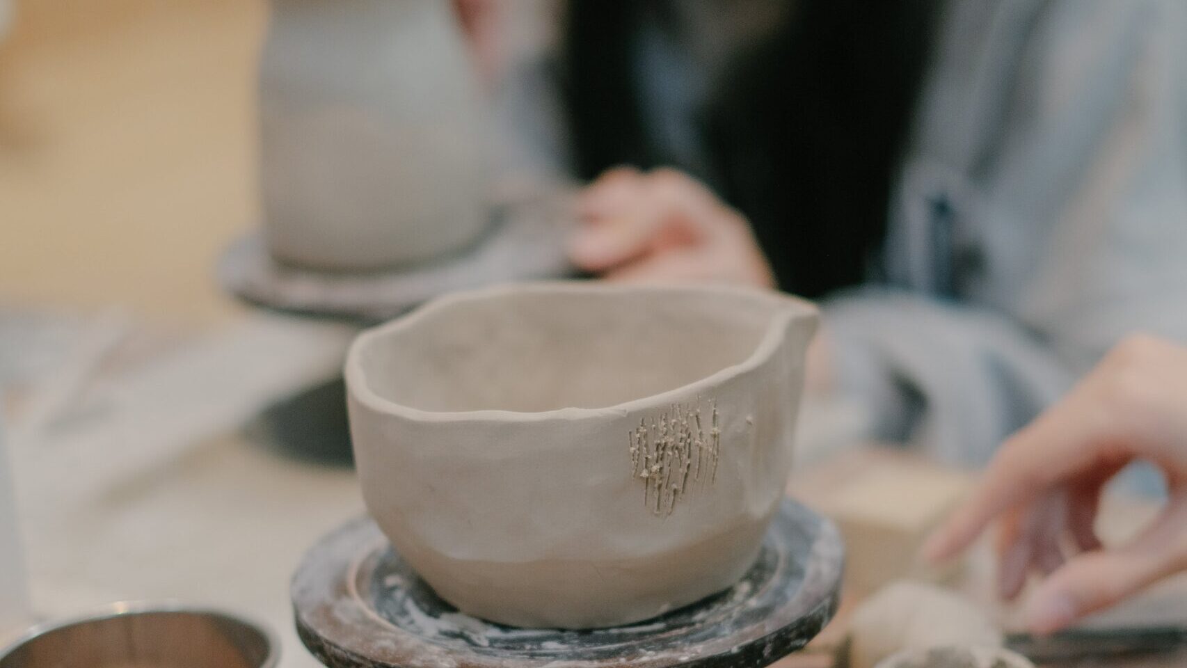 scored hand built pottery